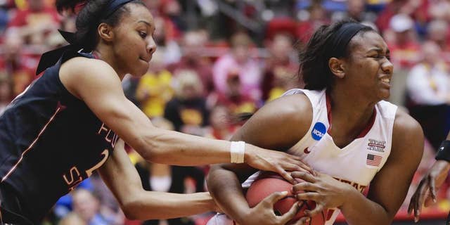 Florida State's Ivey Slaughter, left, and Iowa State's Fallon Ellis (32) struggle for the ball in the second half of a first-round game in the NCAA women's college basketball tournament in Ames, Iowa, Saturday, March 22, 2014. Florida State won 55-44. (AP Photo/Nati Harnik)