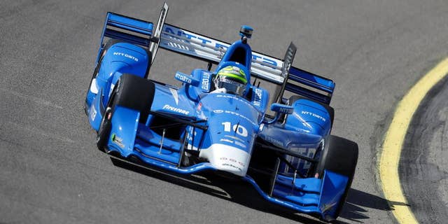 Tony Kanaan drives his car during practice for the IndyCar Series auto race Saturday, July 9, 2016, at Iowa Speedway in Newton, Iowa. (AP Photo/Charlie Neibergall)