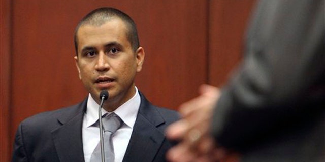 April 20, 2012: In this file photo, George Zimmerman, left, answers a question from attorney Mark O'Mara during a bond hearing in Sanford, Fla. (AP)