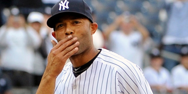 Sept 19: New York Yankees Mariano Rivera blows a kiss to the crowd to acknowledge cheers after recording his 602nd save as the Yankees beat the Minnesota Twins 6-4 at Yankee Stadium in New York.