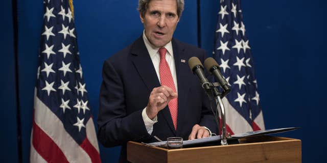 U.S. Secretary of State John Kerry speaks during a press conference at the David Citadel Hotel in Jerusalem on Sunday, Jan. 5, 2014. Kerry is heading to Jordan and Saudi Arabia to discuss his effort to broker peace between Israel and the Palestinians, yet his conversations with the U.S. allies will undoubtedly turn to other Mideast trouble spots. Kerry said Saturday that progress is being made in the Israeli-Palestinian talks, yet key hurdles are yet to be overcome. (AP Photo/Brendan Smialowski, Pool)