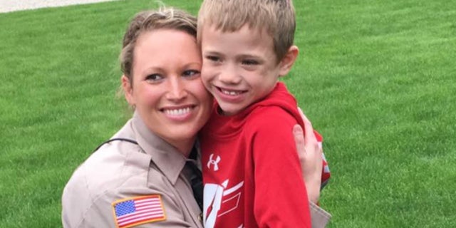 Officer Lindsey Bittorf, left, did not know Jackson, right, before volunteering to give him a kidney.