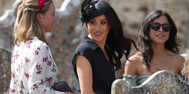 The newest royal apparently buttoned up her dress soon after arrival.