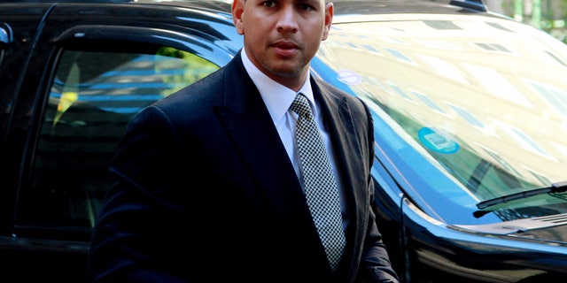 FILE - This Oct. 1, 2013 file photo shows New York Yankees' Alex Rodriguez arrivng at the offices of Major League Baseball in New York. Rodriguez sued Major League Baseball and its players' union Monday, Jan. 13, 2014 seeking to overturn a season-long suspension imposed by an arbitrator who ruled there was "clear and convincing evidence" he used three banned substances and twice tried to obstruct the sport's drug investigation. (AP Photo/David Karp, file)