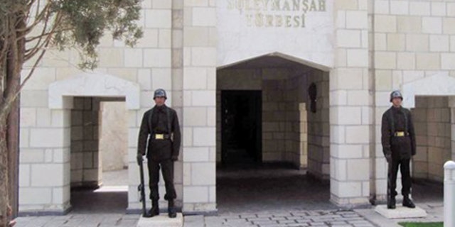 April 7, 2011: Turkish soldiers stand guard at the entrance of the memorial site of Suleyman Shah, grandfather of Osman I, founder of the Ottoman Empire, in Karakozak village, northeast of Aleppo, Syria.