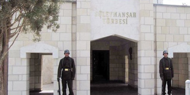 April 7, 2011: Turkish soldiers stand guard at the entrance of the memorial site of Suleyman Shah, grandfather of Osman I, founder of the Ottoman Empire, in Karakozak village, northeast of Aleppo, Syria.