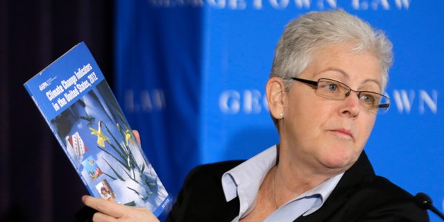 Feb. 21, 2013: Gina McCarthy, then-Assistant Administrator with the Environmental Protection Agency and current Administrator, holds a climate change report as she speaks at a climate workshop sponsored by The Climate Center at Georgetown University.