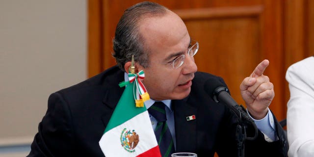 Mexico's President Felipe Calderon, gestures during a meeting with victims of violence in Mexico City, Thursday June 23, 2011. Calderon says he doesn't regret his strategy to fight organized crime, despite calls to end a confrontation that has killed at least 35,000 during his administration. (AP Photo/Eduardo Verdugo)