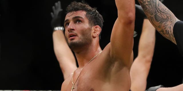 LAS VEGAS, NV - JULY 9: Gegard Mousasi celebrates his victory over Thiago Santos (L) during the UFC 200 event at T-Mobile Arena on July 9, 2016 in Las Vegas, Nevada. (Photo by Rey Del Rio/Getty Images)