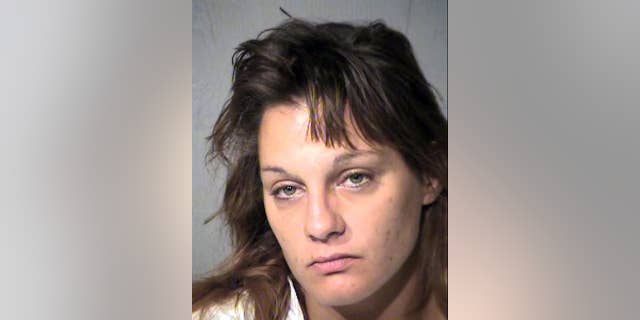 This undated photo provided by the Maricopa County, Ariz., Sheriff's Department shows Jenna Keller. Phoenix police allege Keller was the intoxicated driver who ran over her boyfriend and another man, killing the other man, as the two men fought in a Phoenix parking lot Thursday, Oct. 20, 2016. Police said the fight was related to traffic but wouldn't elaborate. Keller was jailed on suspicion of second-degree murder and aggravated assault. (Maricopa County Sheriff's Department via AP)