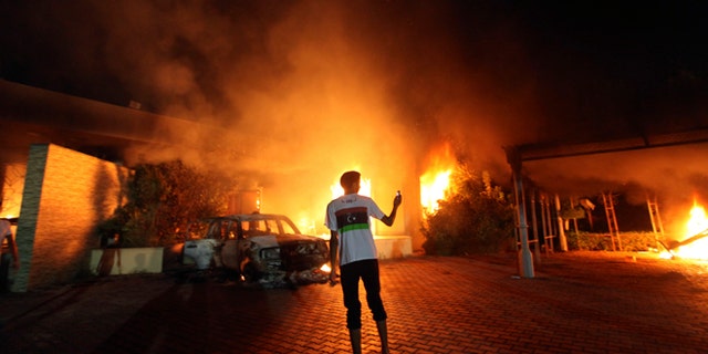 Sept. 11, 2012: The U.S. Consulate in Benghazi is seen in flames.