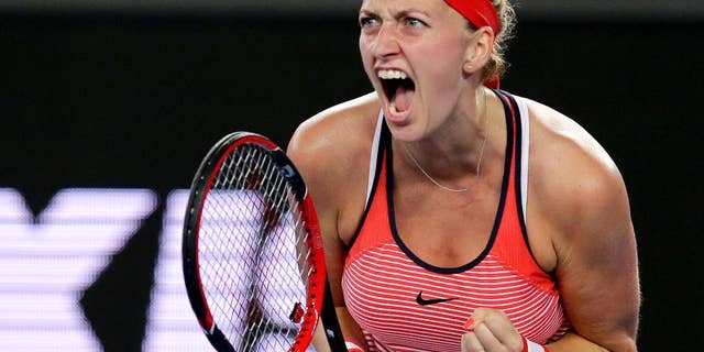 This is a Wednesday, Jan. 20, 2016 file photo of Petra Kvitova of the Czech Republic, clenches her left hand as she reacts after winning a point against Daria Gavrilova of Australia during their second round match at the Australian Open tennis championships in Melbourne, Australia.