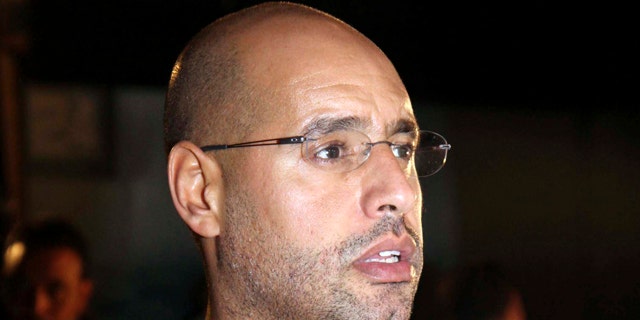 Feb. 22: Saif al-Islam Qaddafi, son of Libyan leader Muammar al-Qaddafi, waits before a press conference in Tripoli, Libya.
