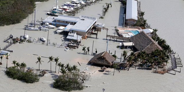 Floodwaters surround Gilbert's Resort in the aftermath of Hurricane Irma, Monday, Sept. 11, 2017, in Key Largo, Fla. (AP Photo/Wilfredo Lee)