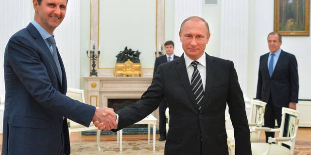 Russia's air campaign in Syria has helped Syrian President Bashar al-Assad, on the left, regain control of his country during the Syrian civil war.  At right is Russian President Vladimir Putin.