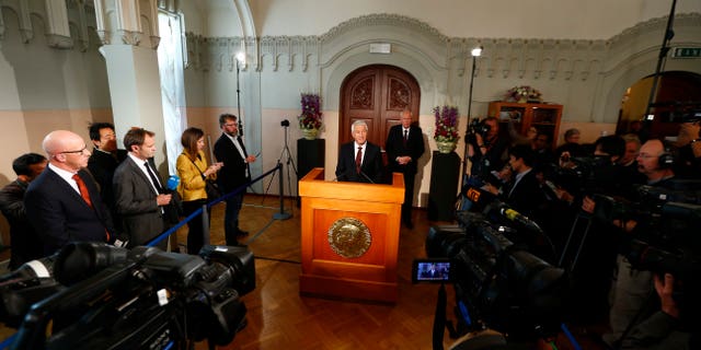 The chairman of the Norwegian Nobel Committee, Thorbjorn Jagland, centre, announces, the winner of the Nobel Peace Prize, at the Nobel Institute, in Oslo, Friday Oct. 11, 2013. The Organization for the Prohibition of Chemical Weapons has won this year's Nobel Peace Prize, it was announced on Friday. The Norwegian Nobel Committee honored the Hague, Netherlands-based global chemical watchdog "for its extensive efforts to eliminate chemical weapons."(AP Photo/ NTB Scanpix, Heiko Junge) NORWAY OUT
