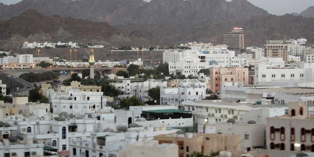 FILE -- In this Sept. 15, 2010 file photo shows a general view of the city, in Muscat, Oman. A new report released Wednesday, July 13, 2016 by Human Rights Watch alleges that foreign maids working in Oman face abuse and conditions that near slavery. The report, based on interviews its researchers conducted with 59 female migrant workers in the sultanate, said some recounted being beaten, verbally abused, denied fair pay and working as much as 20-hour days. (AP Photo/Kamran Jebreili, File)