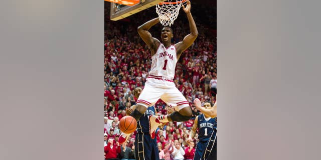 FILE - In this Feb. 12, 2014 file photo, Indiana's Noah Vonleh (1) celebrates after a slam dunk in the second half of an NCAA college basketball game against Penn State, in Bloomington, Ind. Vonleh is a possible pick in the 2014 NBA Draft, Thursday, June 26, 2014 in New York. (AP Photo/Doug McSchooler, File)