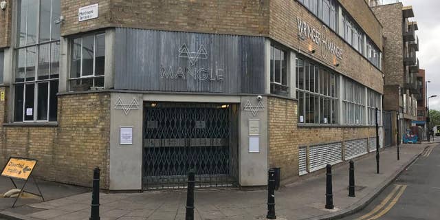 General view of the Mangle nightclub in Dalston, east London on Monday April 17, 2017. London police are investigating an acid attack at a London club that led to a mass evacuation with 12 people injured. Police said Monday April 17, 2017 that 12 people were treated at hospitals for burns. None of the injuries were said to be life-threatening. (Jack Hard/PA via AP)