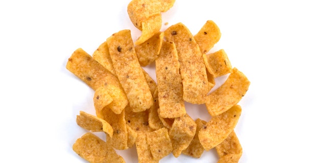 Tortilla corn chips on white background