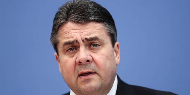 German Vice Chancellor and Minister for Economy and Energy Sigmar Gabriel attends a news conference to present the annual German economic report with the government's economy projection in Berlin, Wednesday, Jan. 28, 2015. (AP Photo/Markus Schreiber)