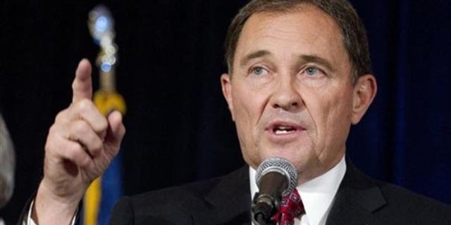 Utah Governor Gary Herbert celebrates his victory over Democratic candidate Peter Corroon Tuesday, Nov. 2, 2010, in Salt Lake City. (AP Photo/Jim Urquhart)