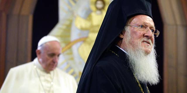Nov. 30, 2014: Pope Francis, left, and Ecumenical Patriarch Bartholomew I arrive for a joint declaration, in Istanbul. (AP)