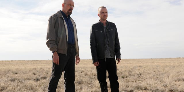FILE - This file image released by AMC shows Bryan Cranston as Walter White, left, and Aaron Paul as Jesse Pinkman in a scene from the season 5 premiere of "Breaking Bad."