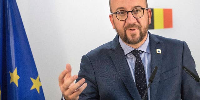 Belgian Prime Minister Charles Michel holds a press conference on the second day of the EU summit in Brussels, Friday, Oct. 21, 2016. The European Union was scrambling Friday to salvage a massive free trade deal with Canada that was being held up by a small region in Belgium. (AP Photo/Olivier Matthys)