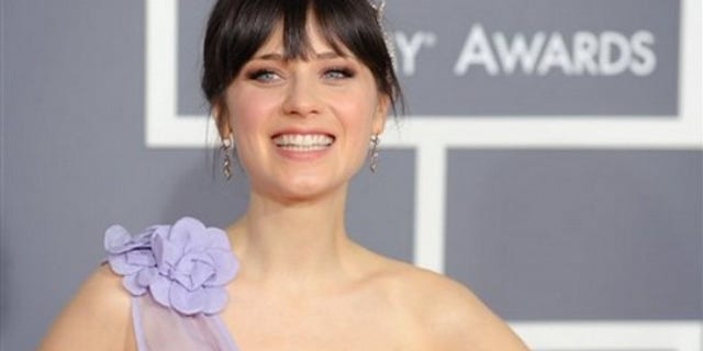 Zooey Deschanel arrives at the 51st Annual Grammy Awards on Sunday, Feb. 8, 2009, in Los Angeles. (AP Photo/Chris Pizzello)