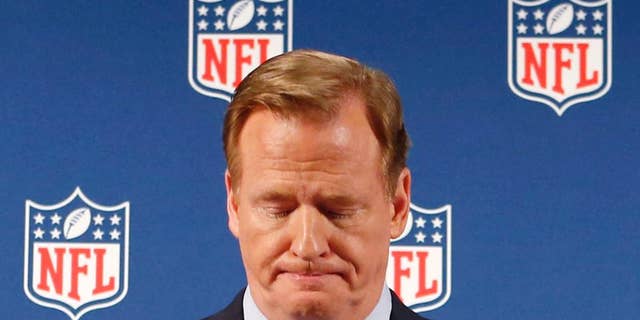 FILE - In this Sept. 19, 2014, file photo, NFL Commissioner Roger Goodell pauses as he speaks during a news conference in New York. Rice has won the appeal of his indefinite suspension by the NFL, which has been "vacated immediately," the players' union said Friday, Nov. 28, 2014. (AP Photo/Jason DeCrow, File)