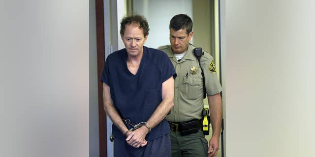 FILE - In this Friday, May 9, 2014, file photo, John Brickman Wall, a Salt Lake City pediatrician awaiting trial on murder in his ex-wife's death, appears in court, in Salt Lake City. Jury selection for Wall's trial is set for Tuesday, Feb. 17, 2015, with opening arguments set for Wednesday. The trial is expected to last four weeks. (AP Photo/Rick Bowmer, Pool, File)
