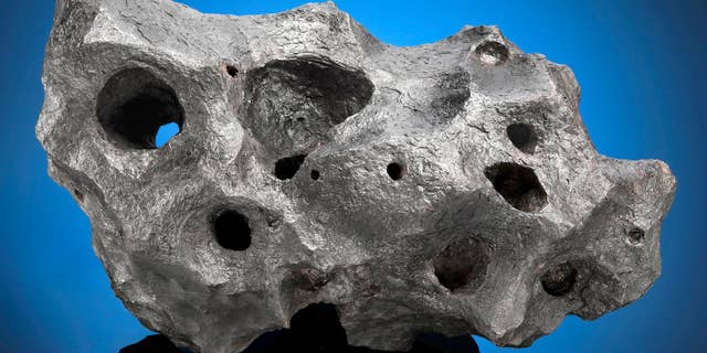 A 70-lb. iron meteorite found in the Arizona desert was bought at an online auction for $237,500.