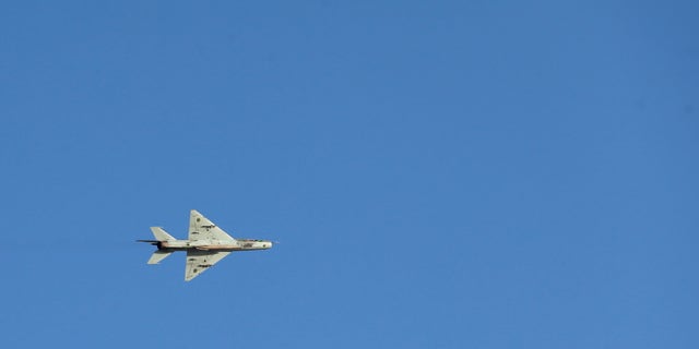 A warplane belonging to Libyan pro-government forces, who are backed by the locals, attempts to bomb sites under the Shura Council of Libyan Revolutionaries, an alliance of former anti-Gaddafi rebels who have joined forces with the Islamist group Ansar al-Sharia, during clashes in Libya April 27, 2016. (REUTERS/Esam Omran Al-Fetori)