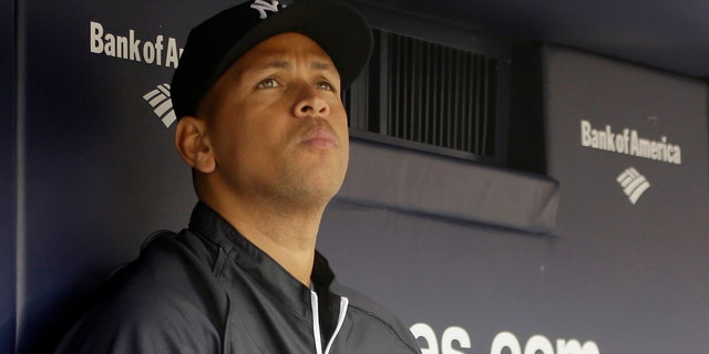 Alex Rodriguez sitting in the dugout during a baseball game at Yankee Stadium in New York, on April 13, 2013.