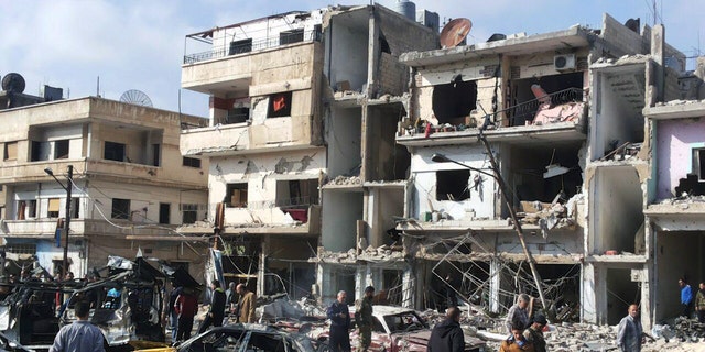 Two blasts in the central Syrian city of Homs killed more than a dozen people and injured many others.