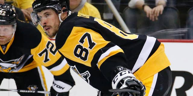 Pittsburgh Penguins' Sidney Crosby prepares to take a face-off during the second period of Game 4 in an NHL hockey Stanley Cup Eastern Conference semifinals against the Washington Capitals in Pittsburgh, Wednesday, May 4, 2016. (AP Photo/Gene J. Puskar)