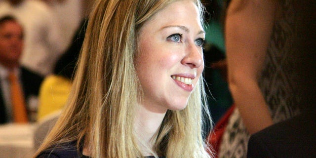 Chelsea Clinton, daughter of former U.S. President Bill Clinton, attends a launching ceremony of Children’s safe drinking water (CSDW) program in Yangon, Myanmar, Monday, May 27, 2013. Clinton marked the 6 billionth liter of clean water in Myanmar Monday providing water purifier packets to provide safe and clean drinking water. (AP Photo/Khin Maung Win)