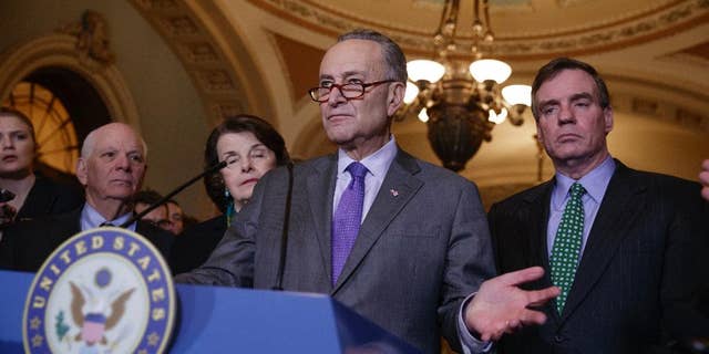 Senate Minority Leader Chuck Schumer, D-N.Y, joined by, from left, Sen. Ben Cardin, D-Md., the ranking member on the Foreign Relations Committee, Sen. Dianne Feinstein, D-Calif., the ranking member of the Senate Judiciary Committee, and Sen. Mark Warner, D-Va., vice-chair of the Intelligence Committee, on Wednesday, Feb. 15, 2017, on Capitol Hill in Washington. (AP Photo/J. Scott Applewhite)