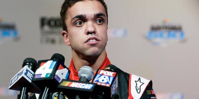 FILE - In this Feb. 16, 2016, file photo, truck series driver Rico Abreu answers questions from members of the media during NASCAR media day at Daytona International Speedwayin Daytona Beach, Fla. Abreu has roughly a dozen starts at Eldora Speedway, where the Truck Series races next week and Abreu likely has his best chance to qualify for NASCAR's playoffs. (AP Photo/John Raoux, File)