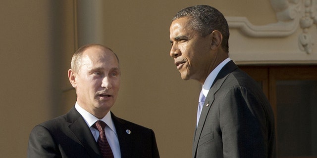 FILE: Sept. 5, 2013: President Obama shakes hands with Russian President Vladimir Putin during arrivals for the G-20 summit at the Konstantin Palace in St. Petersburg, Russia.