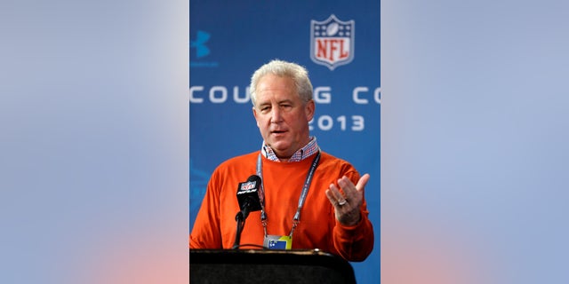 Denver Broncos head coach John Fox answers a question during a news conference at the NFL football scouting combine in Indianapolis, Thursday, Feb. 21, 2013. (AP Photo/Michael Conroy)