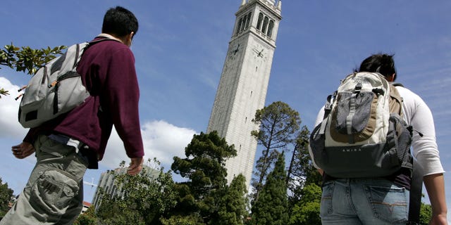 BERKELEY, CA - APRIL 17: UC Berkeley students walk by Sather Tower on the UC Berkeley campus April 17, 2007 in Berkeley, California. Robert Dynes, President of the University of California, said the University of California campuses across the state will reevaluate security and safety policies in the wake of the shooting massacre at Virginia Tech that left 33 people dead, including the gunman, 23 year-old student Cho Seung-Hui. (Photo by Justin Sullivan/Getty Images)