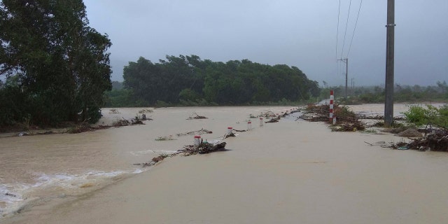 This photo taken on Saturday Nov. 4, 2017, shows a flooded road in central province of Binh Dinh, Vietnam following Typhoon Damrey hit the area.