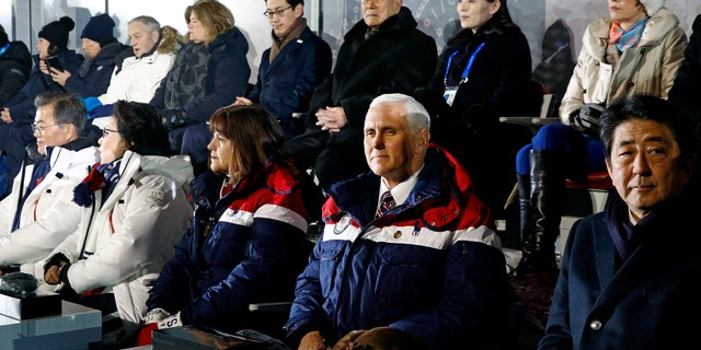 Vice President Mike Pence, second from bottom right, sits between second lady Karen Pence, third from bottom left, and Japanese Prime Minister Shinzo Abe at the opening ceremony of the 2018 Winter Olympics in Pyeongchang, South Korea, Friday, Feb. 9, 2018. Seated behind Pence are Kim Yong Nam, third from top right, president of the Presidium of North Korean Parliament, and Kim Yo Jong, second from top right, sister of North Korean leader Kim Jong Un. (AP Photo/Patrick Semansky, Pool)