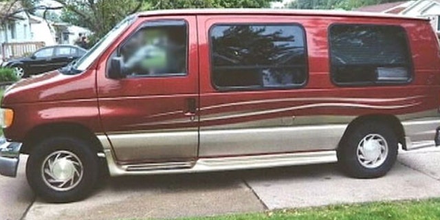 This undated image shows the van driven by the man who police say completed a trip with a dead body in his passenger seat. (MyFoxDetroit.com)