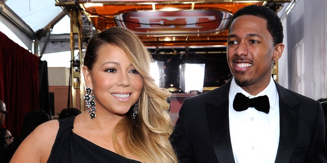 Mariah Carey and Nick Cannon, pictured in 2014, share twins Moroccan and Monroe.