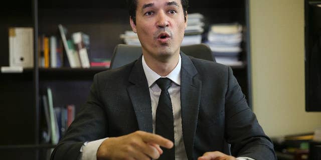 Deltan Dallagnol, lead federal prosecutor in the so-called Car Wash investigation, gives an interview in Curitiba, Brazil, Thursday, Jan. 26, 2017. The lead federal prosecutor in the massive corruption investigation roiling Brazil says recent developments could double the size of the case, a staggering possibility given that the probe has ensnared many of the country’s elite, threatens to bring down President Michel Temer and is expanding to other Latin American countries. (AP Photo/Andre Penner)