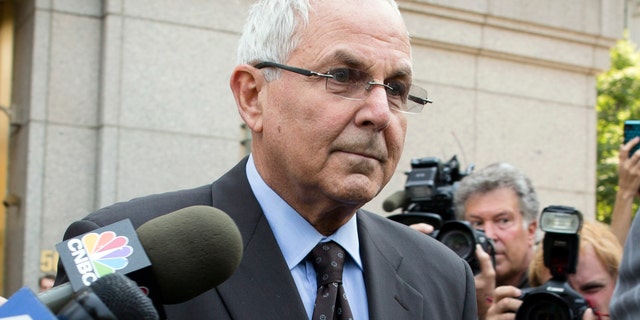 FILE - In this June 29, 2012 file photo, Peter Madoff leaves Federal Court in New York after pleading guilty to criminal charges. The prison-bound brother of Wall Street swindler Bernard Madoff has attended his granddaughter's bat mitzvah in New York. Peter Madoff was sentenced in December to 10 years in prison for his role in the massive Ponzi scheme. The judge delayed his lockup date so he could attend the Jewish ceremony. The 67-year-old pleaded guilty in June to charges that he created false documents while he was chief compliance officer at his brother's firm. (AP Photo/John Minchillo, File)