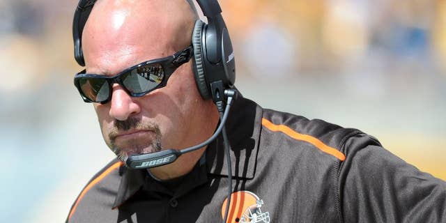 Cleveland Browns head coach Mike Pettine walks the sideline in the second quarter of an NFL football game against the Pittsburgh Steelers, Sunday, Sept. 7, 2014, in Pittsburgh. (AP Photo/Don Wright)